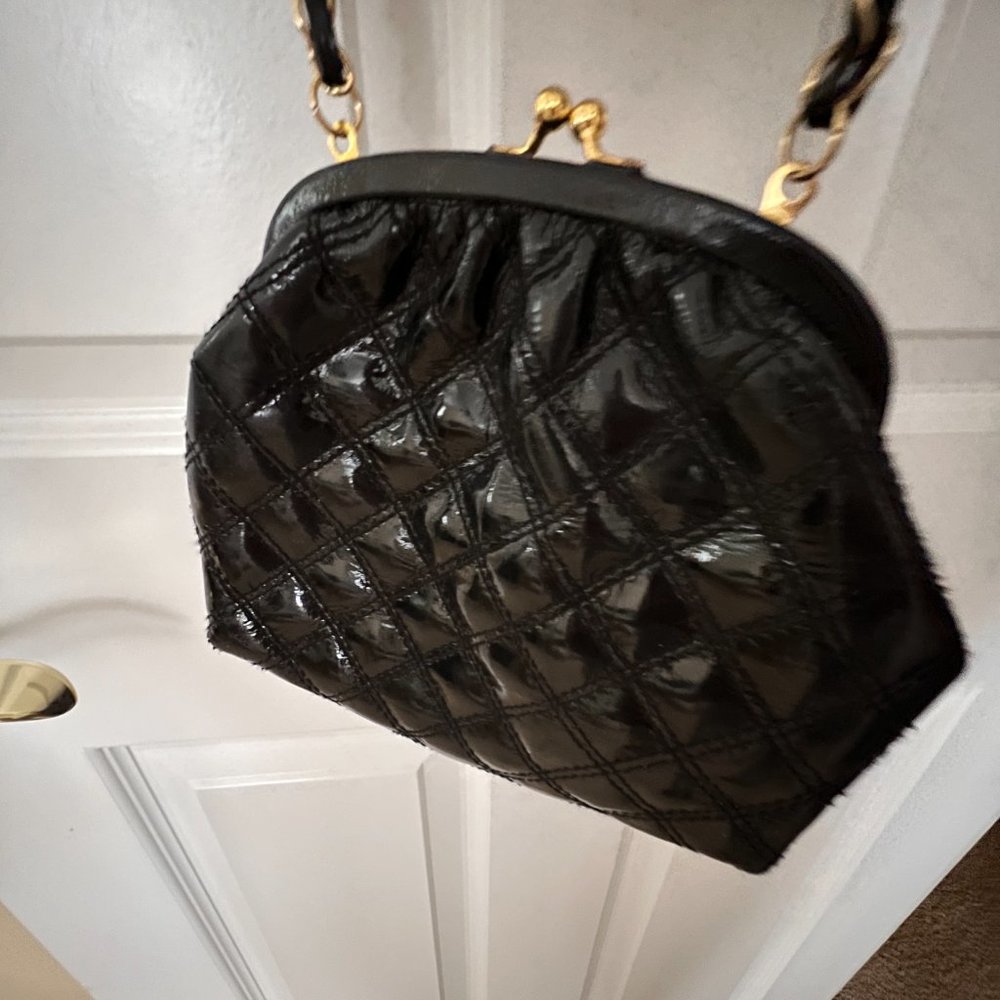 Paradox leather quilted crossbody bag